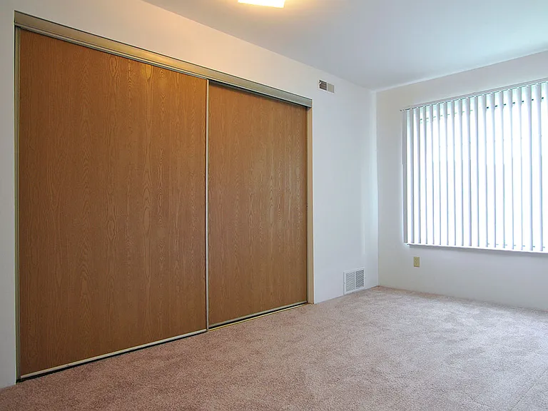 A bedroom at Charter Oak Apartments, Davison, Michigan