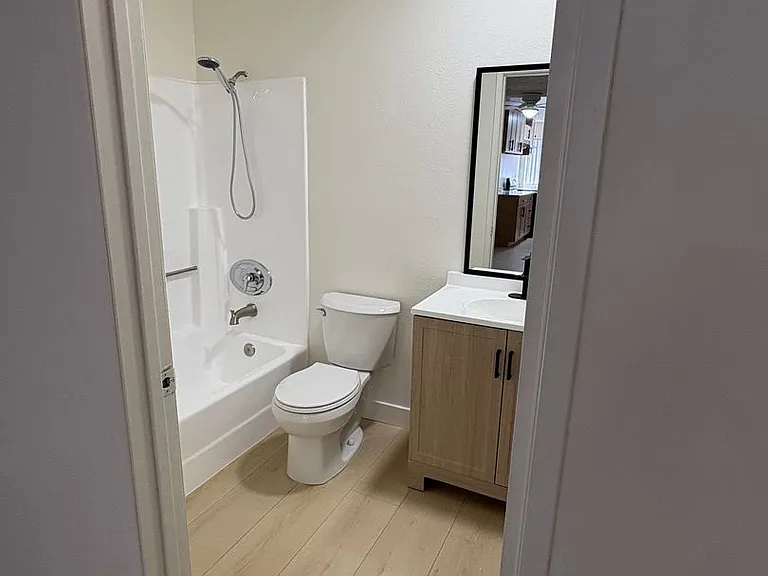 WOD - Woodman Apartments — Photo 9
