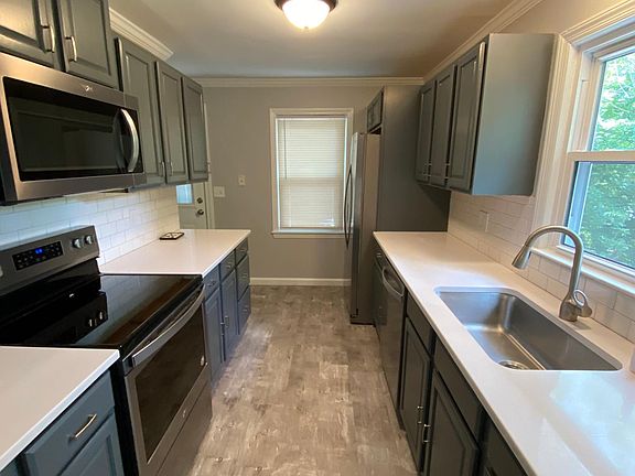 Updated kitchen with new appliances and quartz counter tops