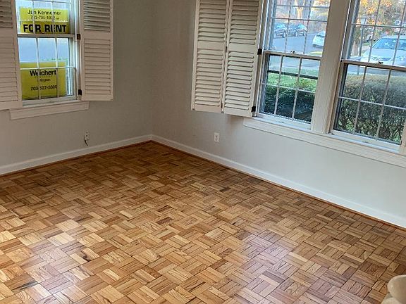 Beautiful hardwood floors and 3 sunny windows with custom shutters.