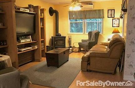 Inviting LR w/ wood-burning stove save $
						:
						Welcome Home! Relax by the fire w/ lovely slate hearth or CAC in Summer. Enjoy!