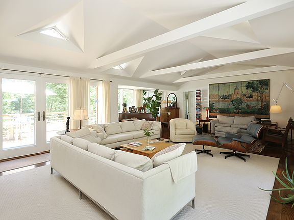 Living room with doors to deck