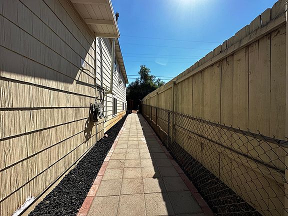 Path from 2 car driveway down to unit front door