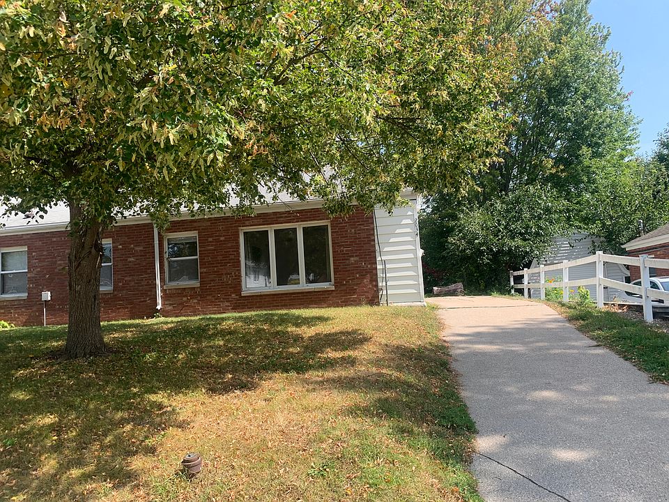 Front of duplex and driveway