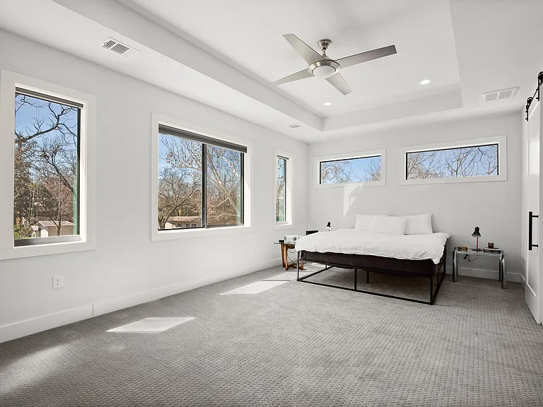 primary bedroom. electronic shades