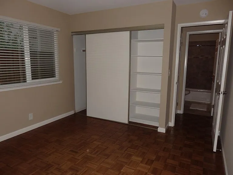 Spacious 2nd Bedroom with huge mirrored closet.