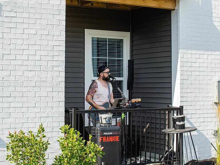 Resident on Patio | Hamilton Woods Apartments | Apartments in Westerville, OH
