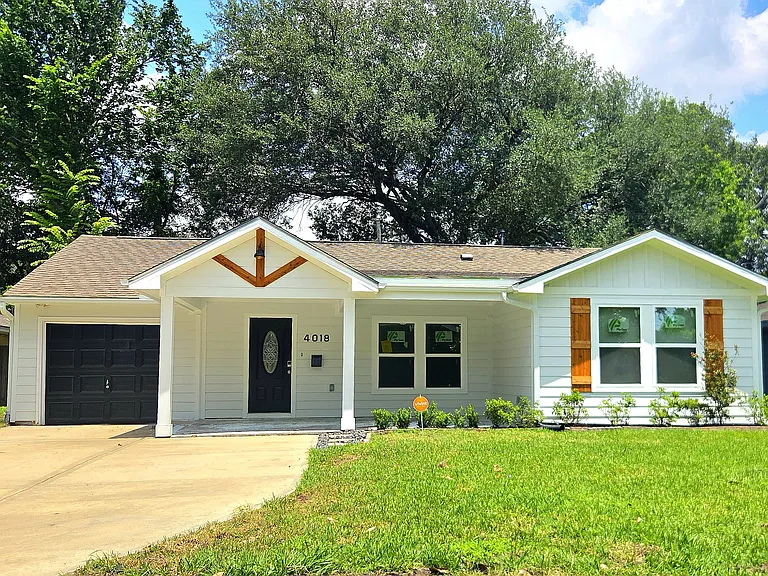 Welcome to 4018 Woodfox. Tastefully renovated with an huge front porch, wide driveway and big front yard. Tons of upgrades.