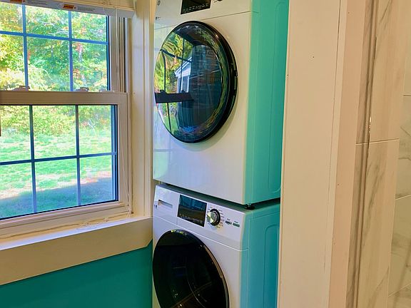 Washer and dryer located in bathroom