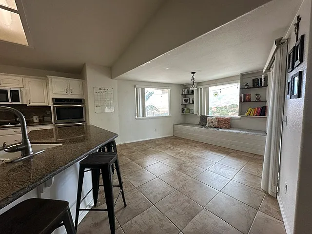 Storage bench off kitchen with views