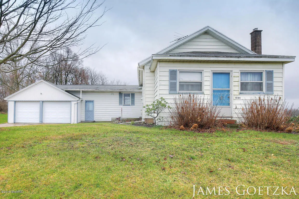 1880 Fifteen Mile Rd NW photo 1