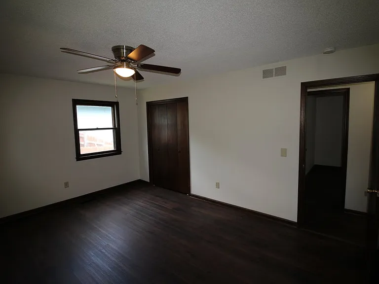 Closet for Bedroom 2 and hallway access.