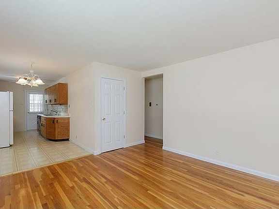 Open to galley kitchen.