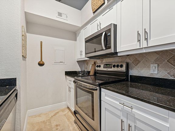 4th image of 1725 Palm Cove Blvd Unit 2-306