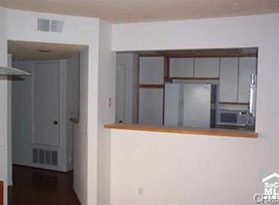 hall to 2nd BR, & kitchen