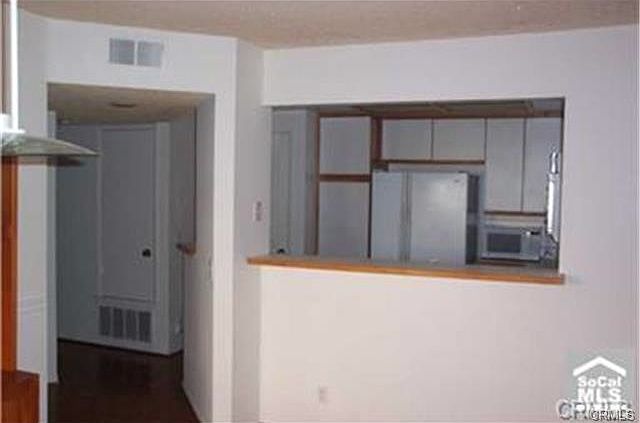 hall to 2nd BR, & kitchen