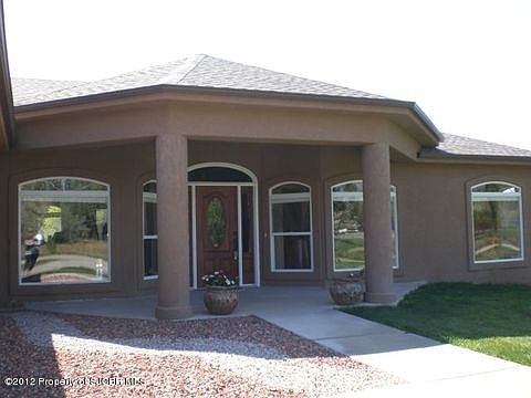 This inviting covered front patio