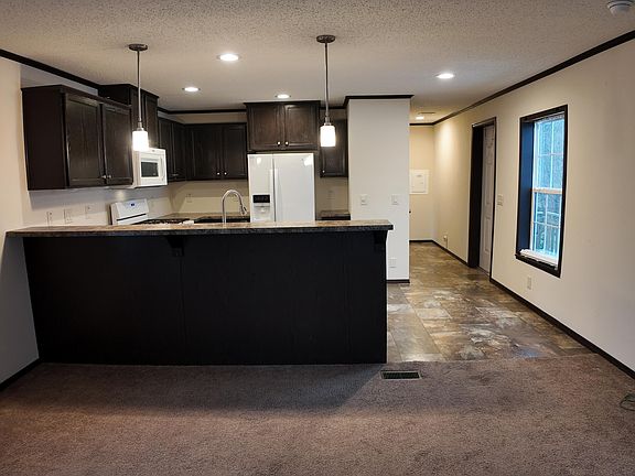 5th image of 11685 Torrey Trl NW
