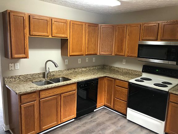 Spacious kitchen with granite countertops