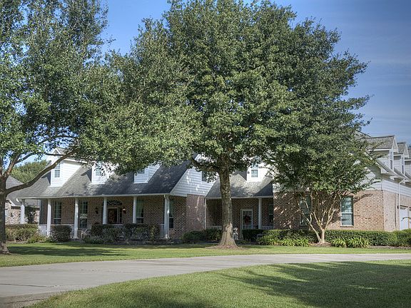 Two front porches. Extended driveway with extra parking in the back..