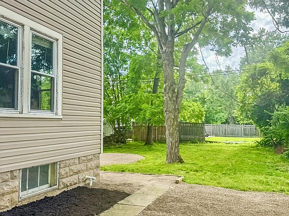 View to backyard from side of house