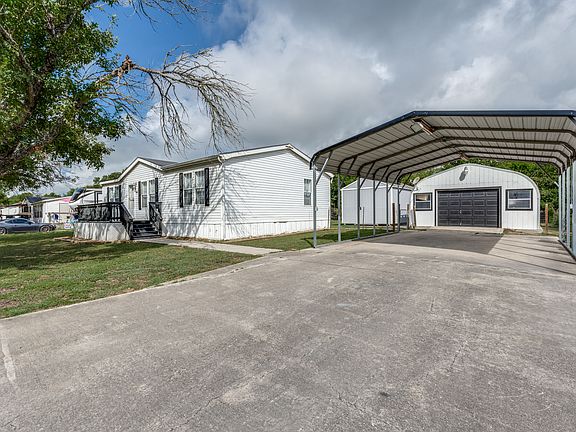 Front View with Carport