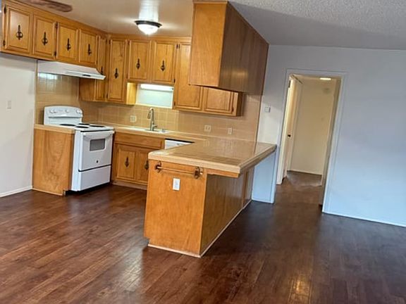 side view of kitchen and living room area