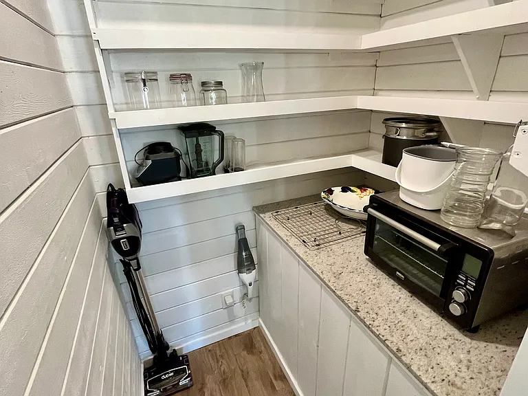 Walk-in kitchen pantry.
Toaster-oven.
Ninja blender.
Bagless vacuum and hand-vacuum.
Tons of shelf storage.