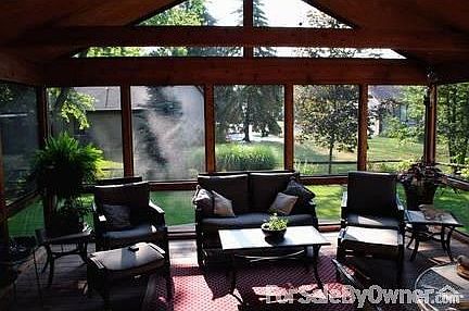 Screened Porch
						:
						The screened porch has a ceiling fan. The beams have gentle lighting for night.