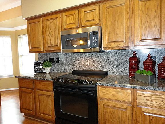 Open planned kitchen for people who like to cook and entertain at the same time .