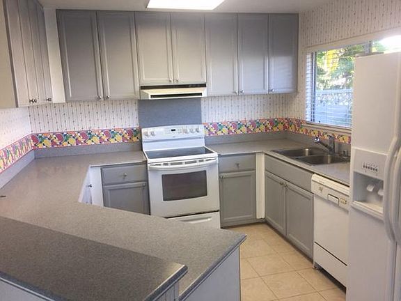 Kitchen with Corian counters