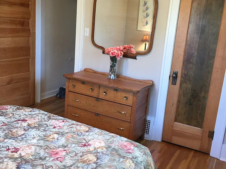 April 2020-Back bedroom furnished as a bedroom. Original doors
