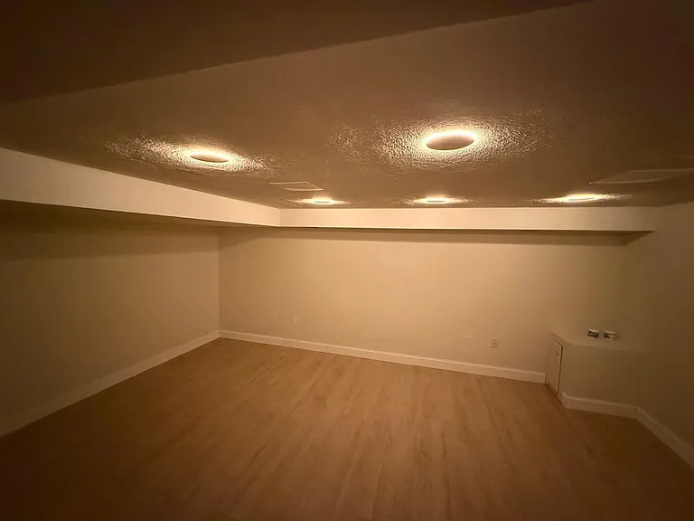 Basement with lighting