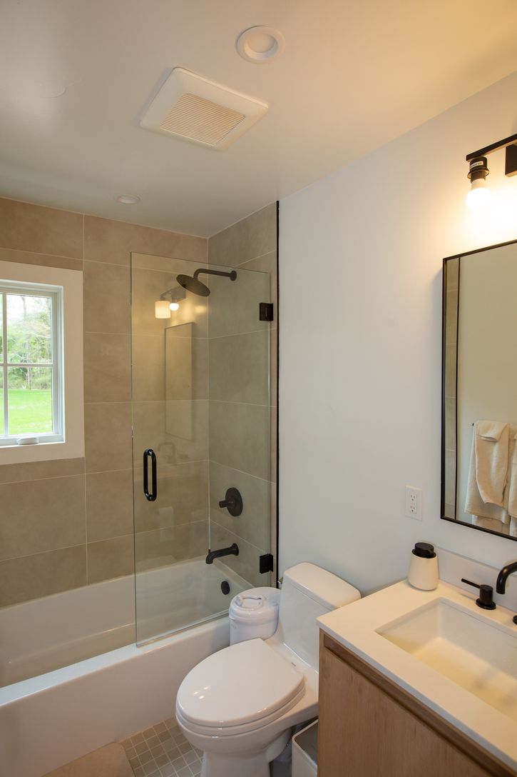  Guest bathroom with bath and shower