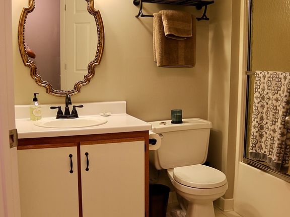 Bathroom next to bed/entry