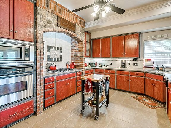 Stunning country style kitchen with gas stove and exterior exhaust.