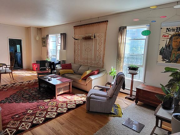 View into living/dining space from the front door