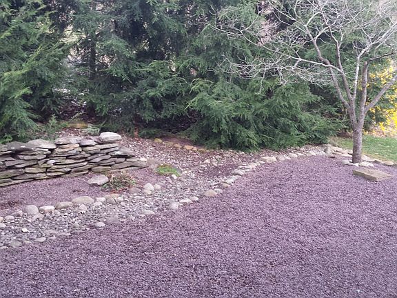 Partial view rear stone wall