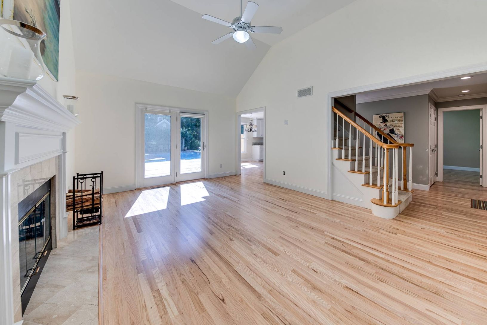  Living Room With Soaring Ceilings & Refinished Floors