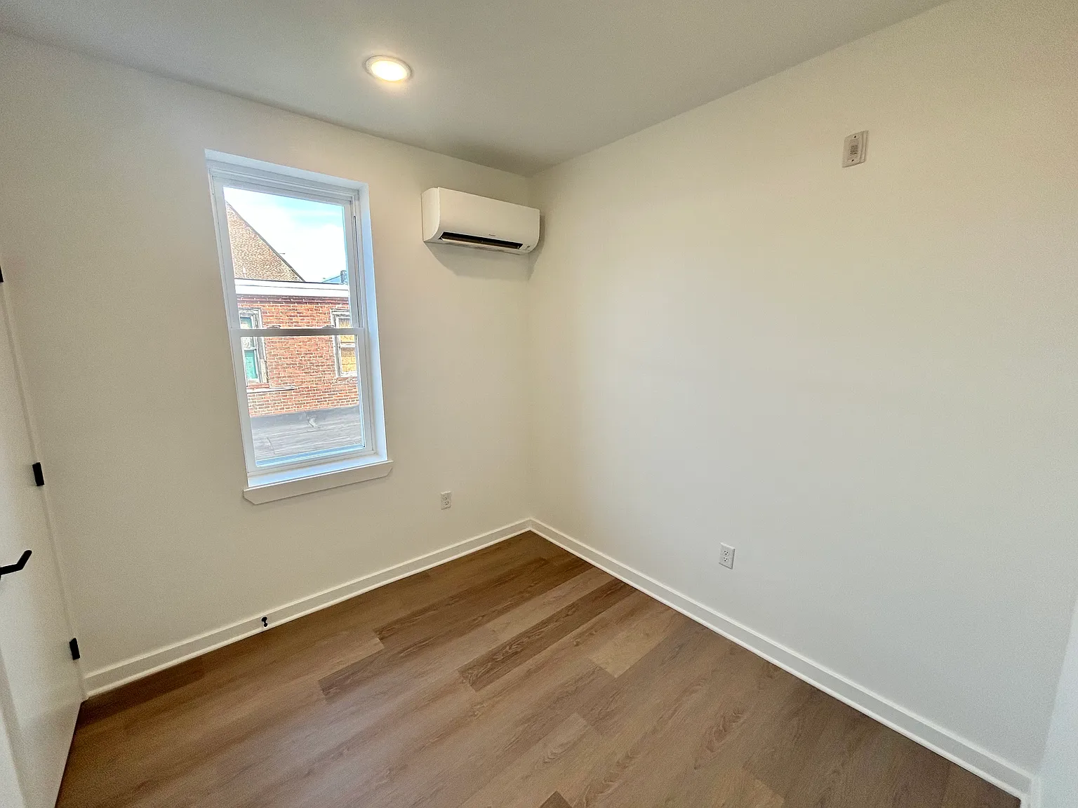 Brand-New Two-Bedroom with Central Air and In-Unit Laundry — Photo 3