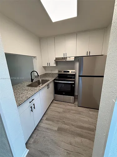 1220 NW 103rd Ln #413 Photo 1