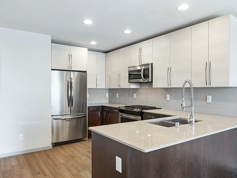 Pull up a seat at the kitchen island for informal dining.