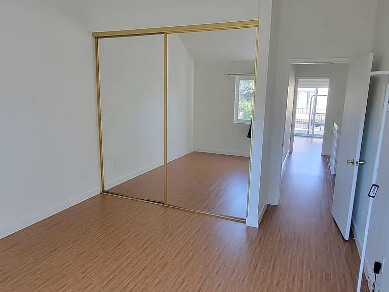 3rd bedroom also has 14ft vaulted ceiling. This room is very bright and large.