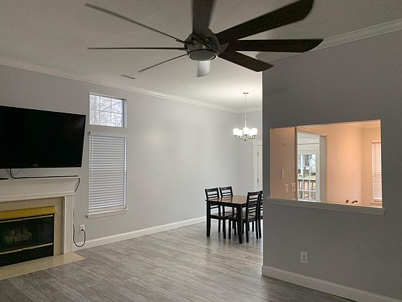 Living, dining, and kitchen pass through