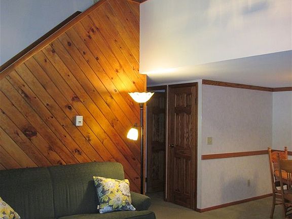 Looking to stairs and loft area.