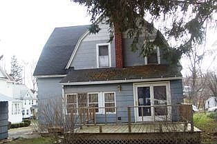 Rear view of home & deck.