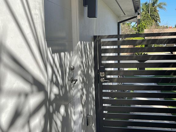 Entrance Private gated entry. East facing unit located at the front of the property.