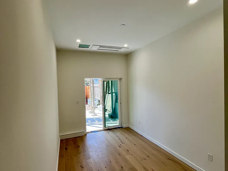 Master Bedroom with access to the back yard