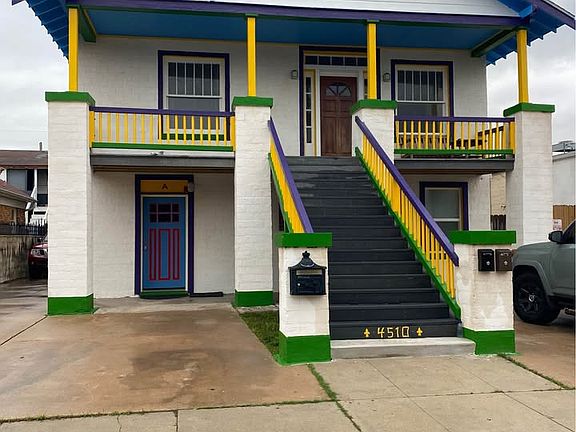 Apt 'A' Bottom blue door.
Mardi Gras Colors!