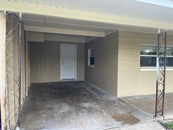 Carport Parking & access to indoor laundry room
